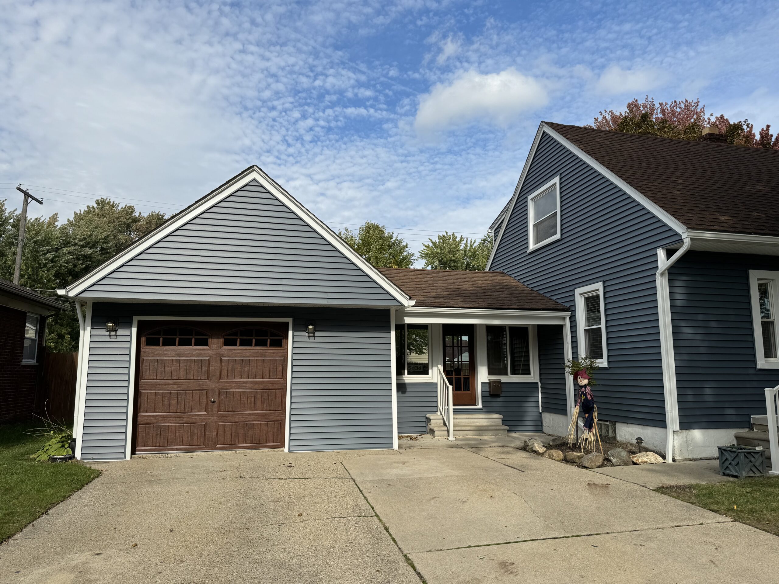 Professional siding installation team at work