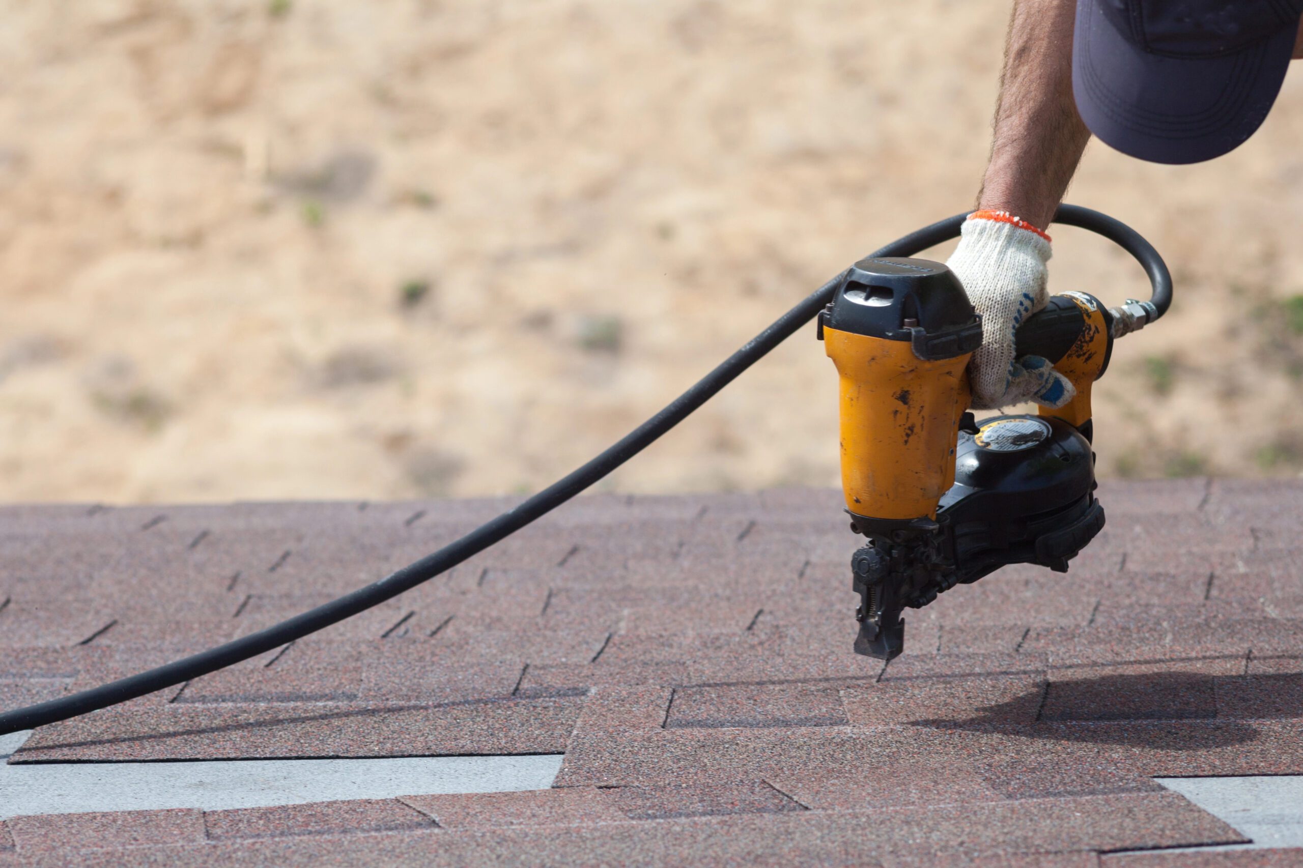 Homeowner interviewing potential roofing contractors