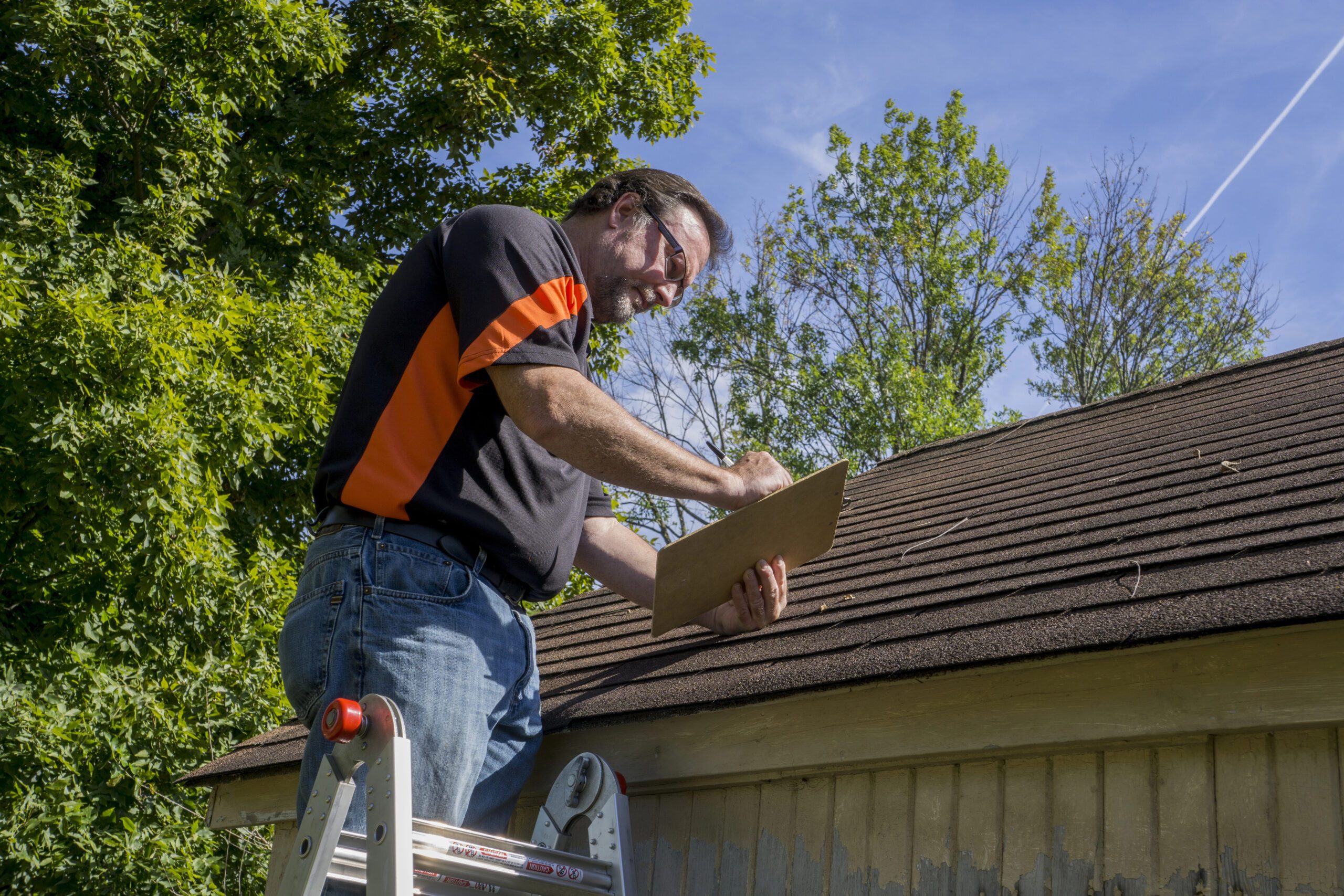 Roofing contractor providing written estimate